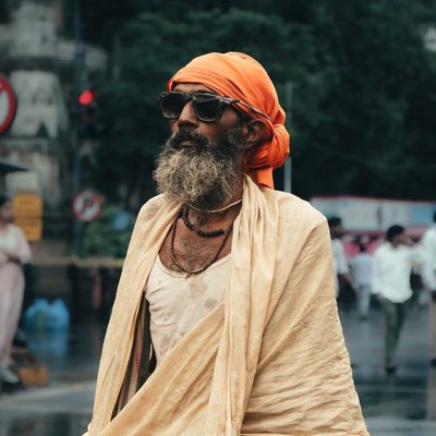 AN OLD MAN WEARING GOGGLES