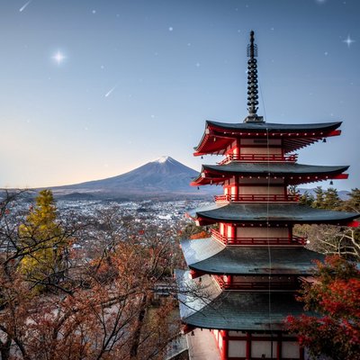a nice temple with the background of mount fuji😍