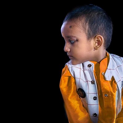Random kid portrait with black background 