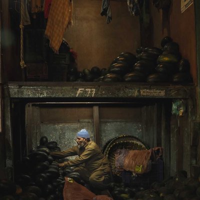 OLD MAN SELLING FRUITS