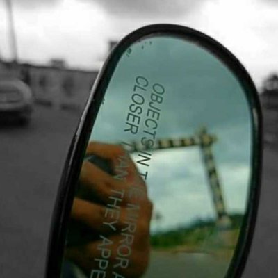 Objects in the mirror are closer than they appear