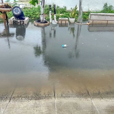 The flood water is murky black 