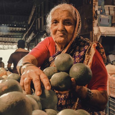 Old lady selling fruits and vegetables