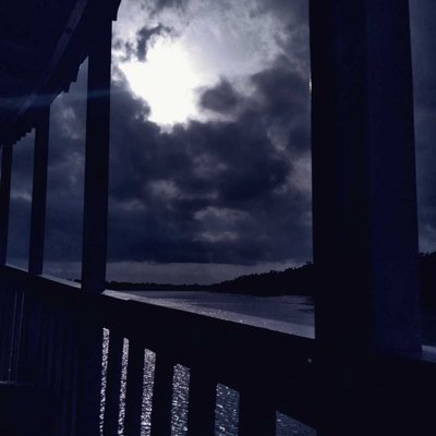 Feeling the moon from boat.