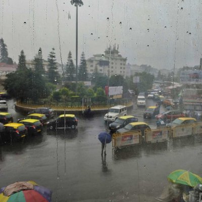 Raindrops on glass reveal Shillong's vibrant heart.