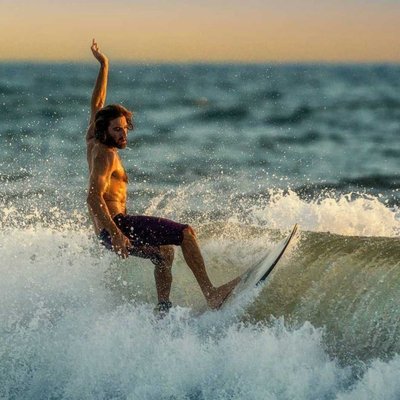 Surfing At Pererenan Beach