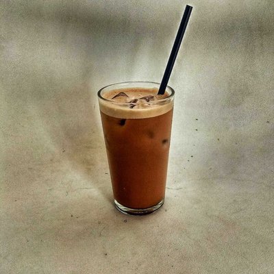 A glass of Iced Coffee Cappuccino by Torabika 