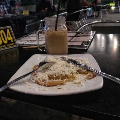 Cane with a sprinkling of cheese and Iced Coffee Milk.