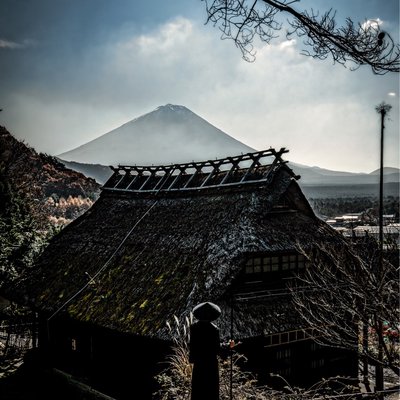 a classic village with the background of Mount Fuji in Japan.