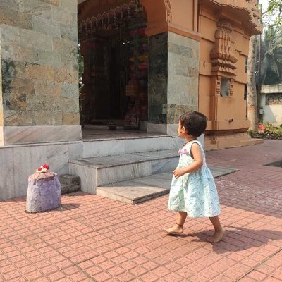 a baby girl in temple.