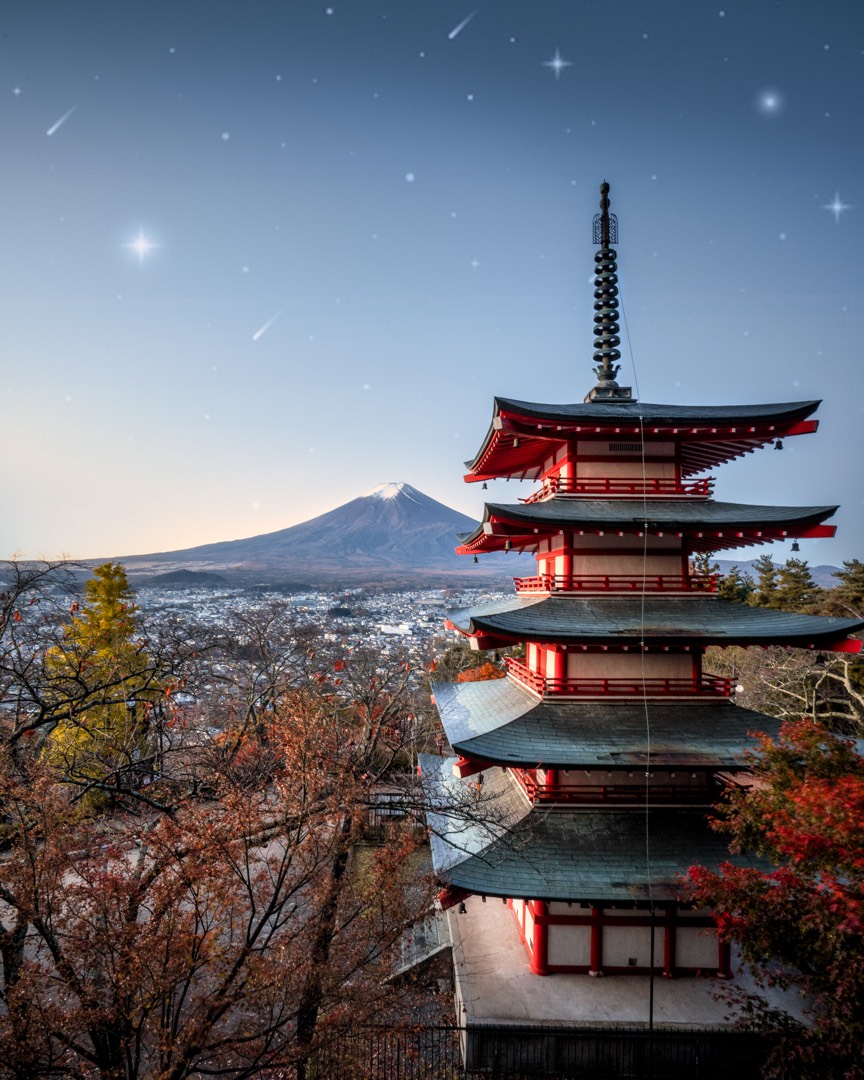 a nice temple with the background of mount fuji😍