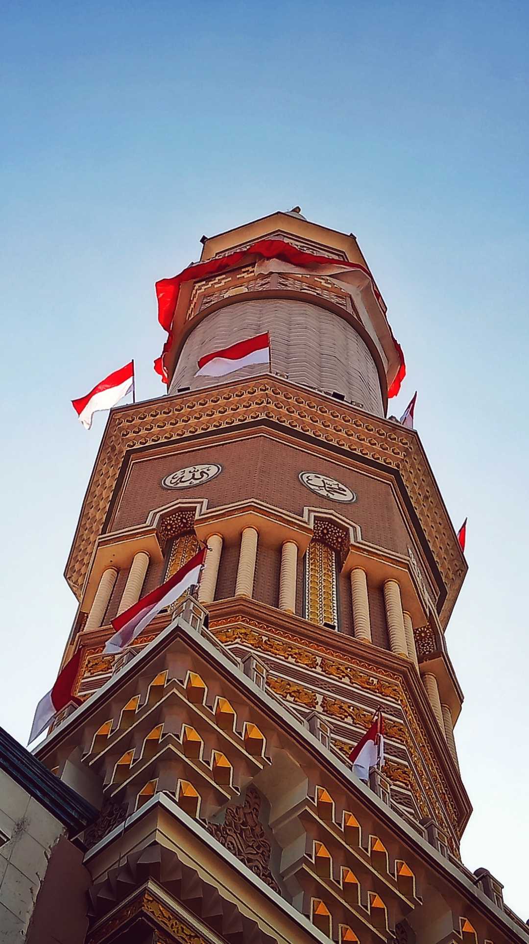 Flags flutters on Minarets 
