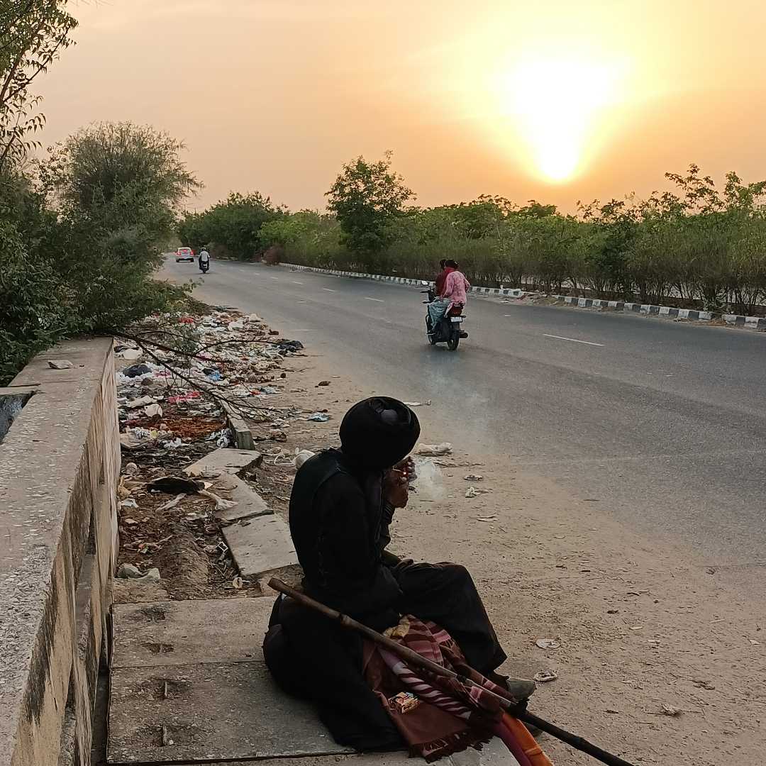 A Fakir smoking Chillum 