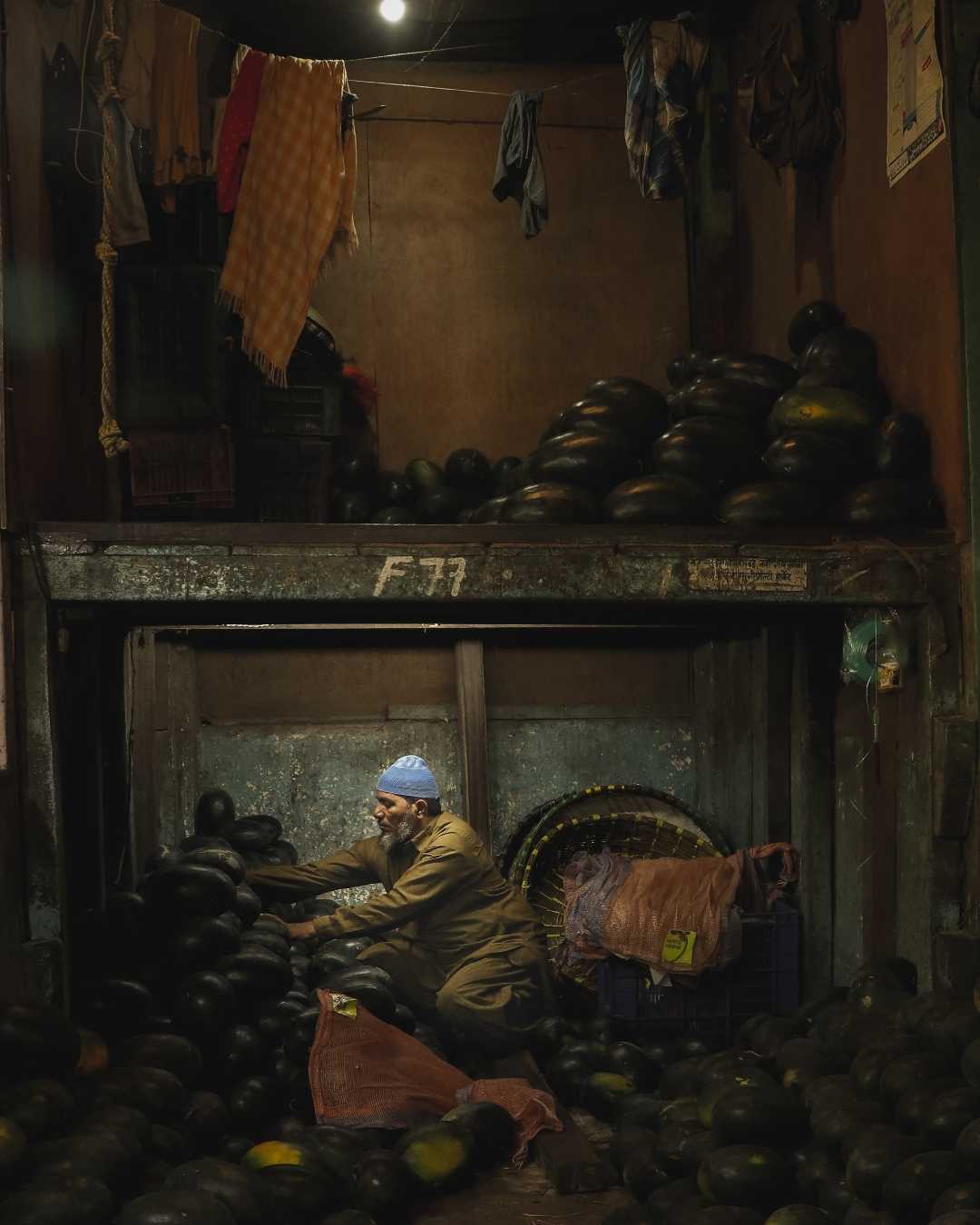 OLD MAN SELLING FRUITS