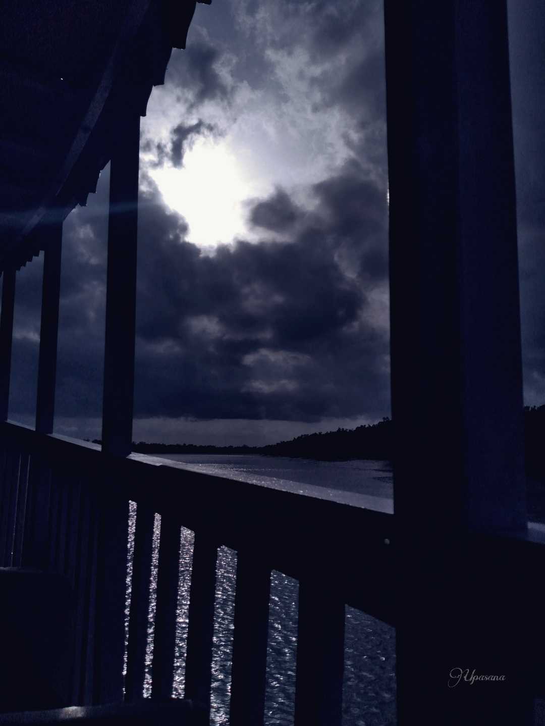 Feeling the moon from boat.