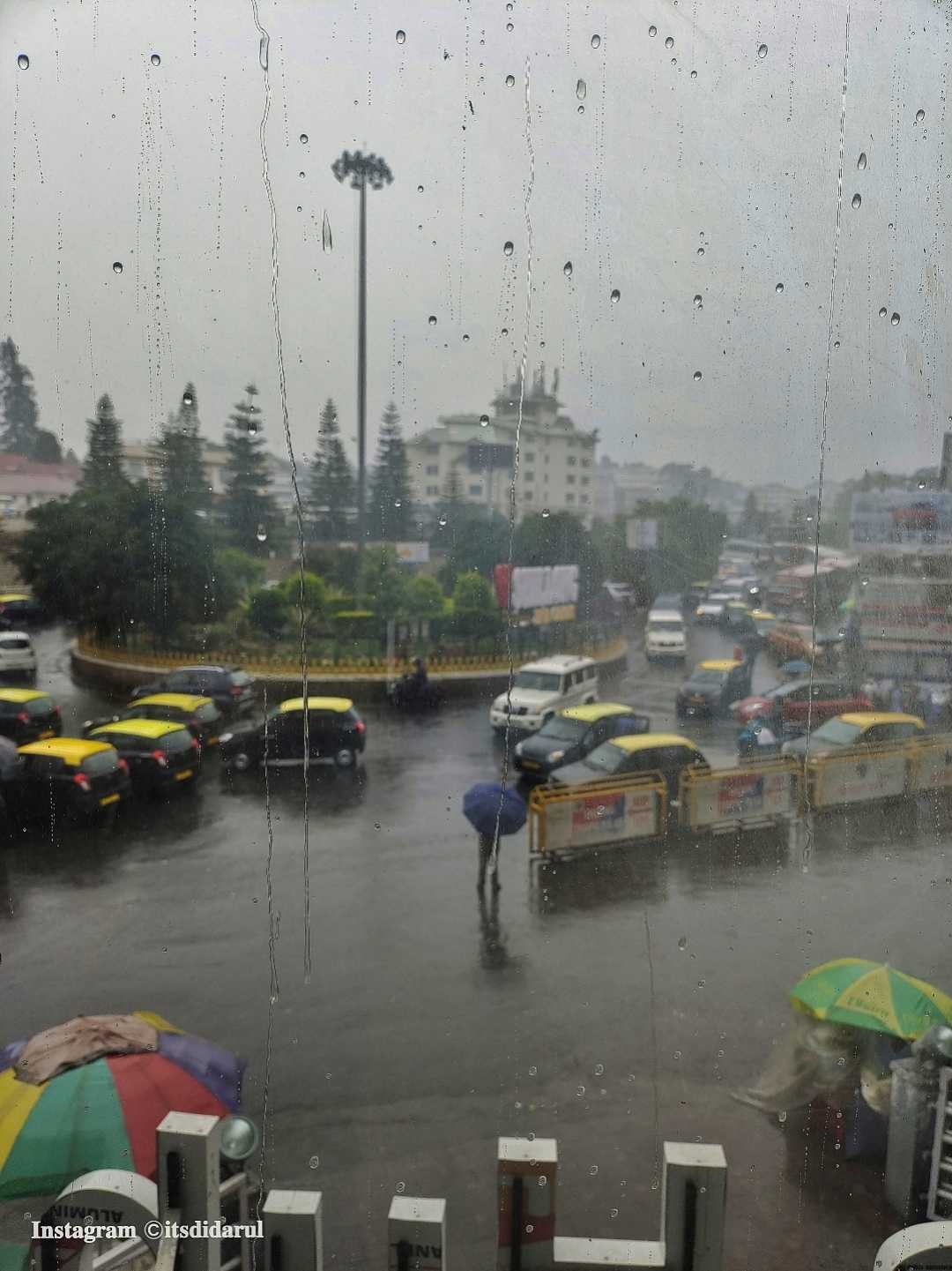 Raindrops on glass reveal Shillong's vibrant heart.