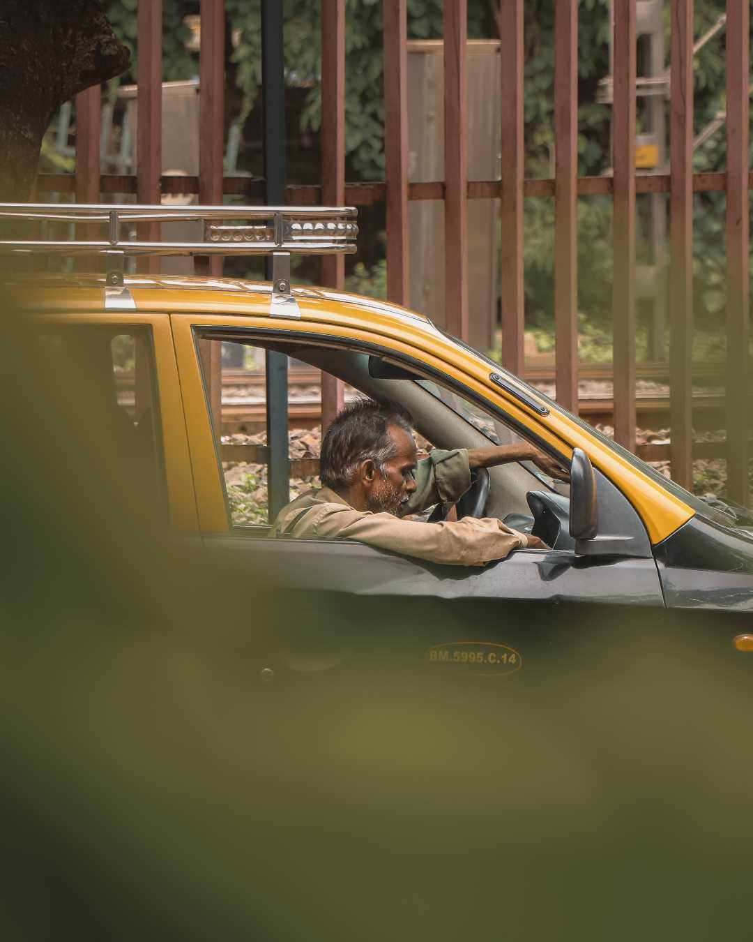 old man in taxi