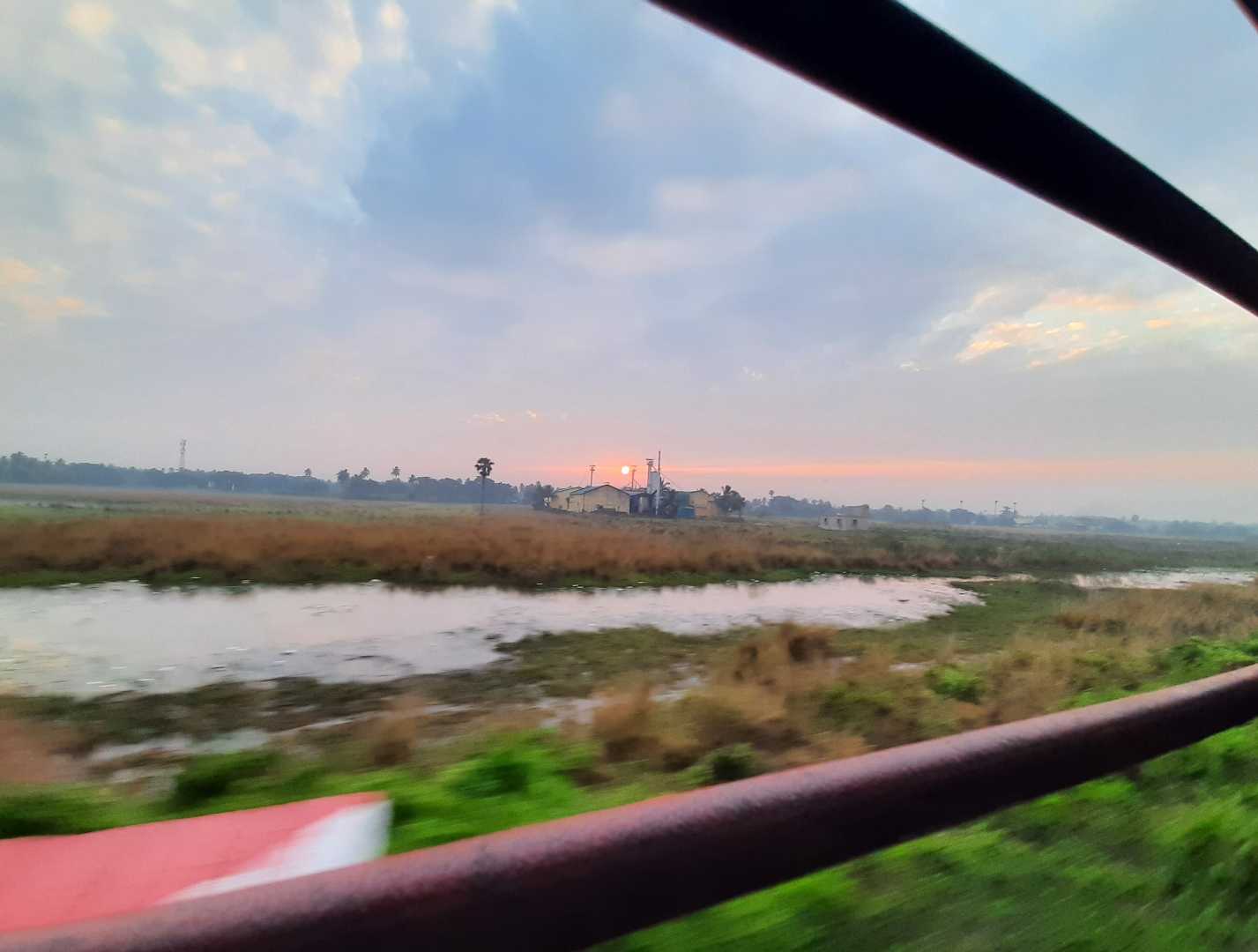 The Sunrise from a Train