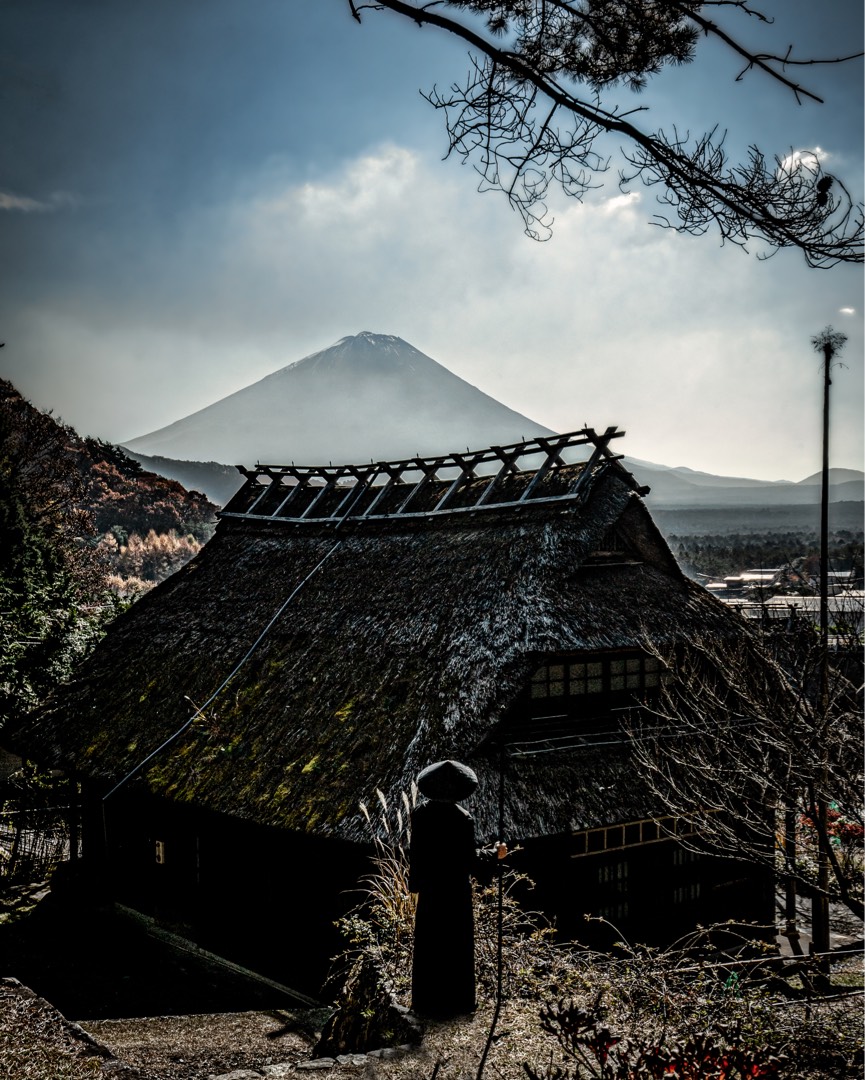 a classic village with the background of Mount Fuji in Japan.